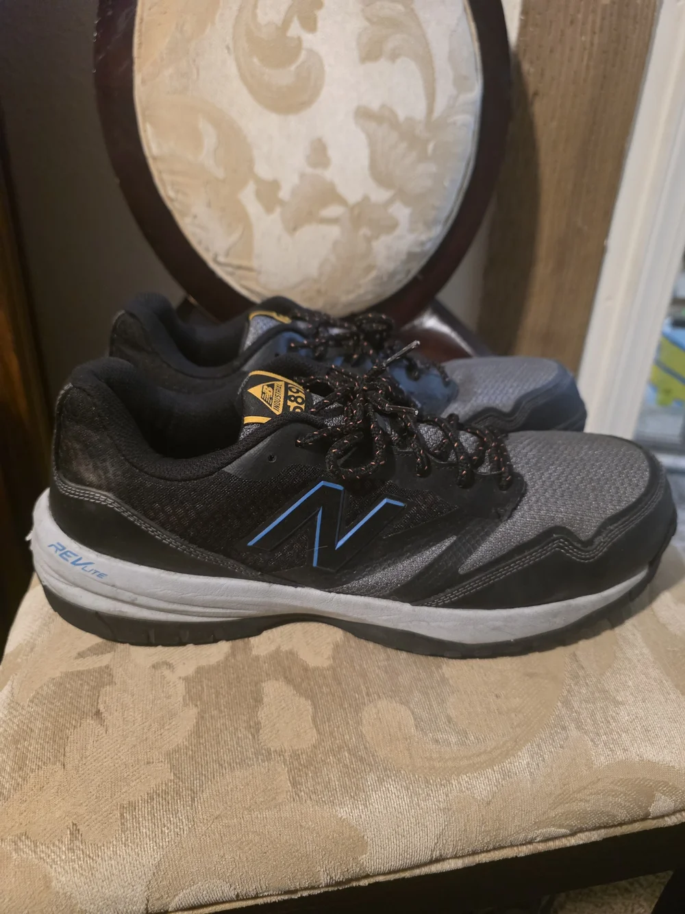 New Balance Gray and Black Men's Athletic Sneakers with Blue Accents